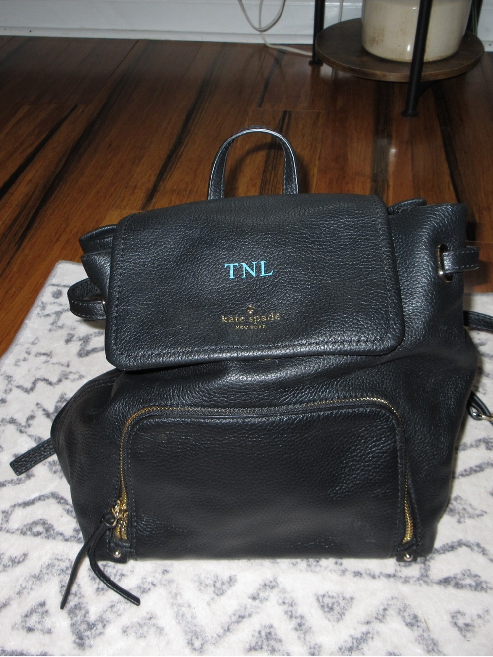 kate spade black pebbled leather backpack with gold hardware